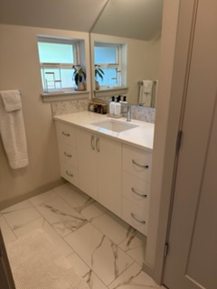 Bathroom — sink, mirror and tile disinfected.