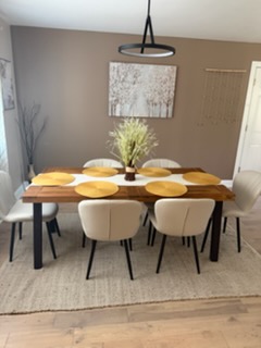 Dining room ready — table and chairs cleaned top to bottom.